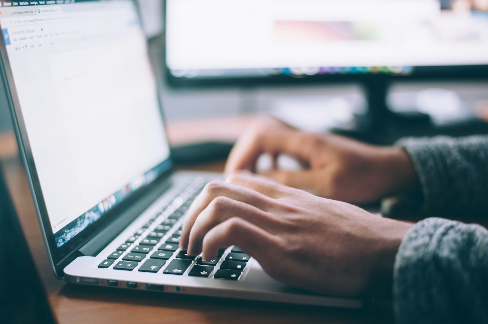 SEO specialist reviewing search visibility reports on a laptop
